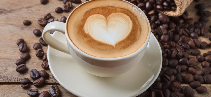 Cup,Of,Coffee,Latte,With,Heart,Shape,And,Coffee,Beans